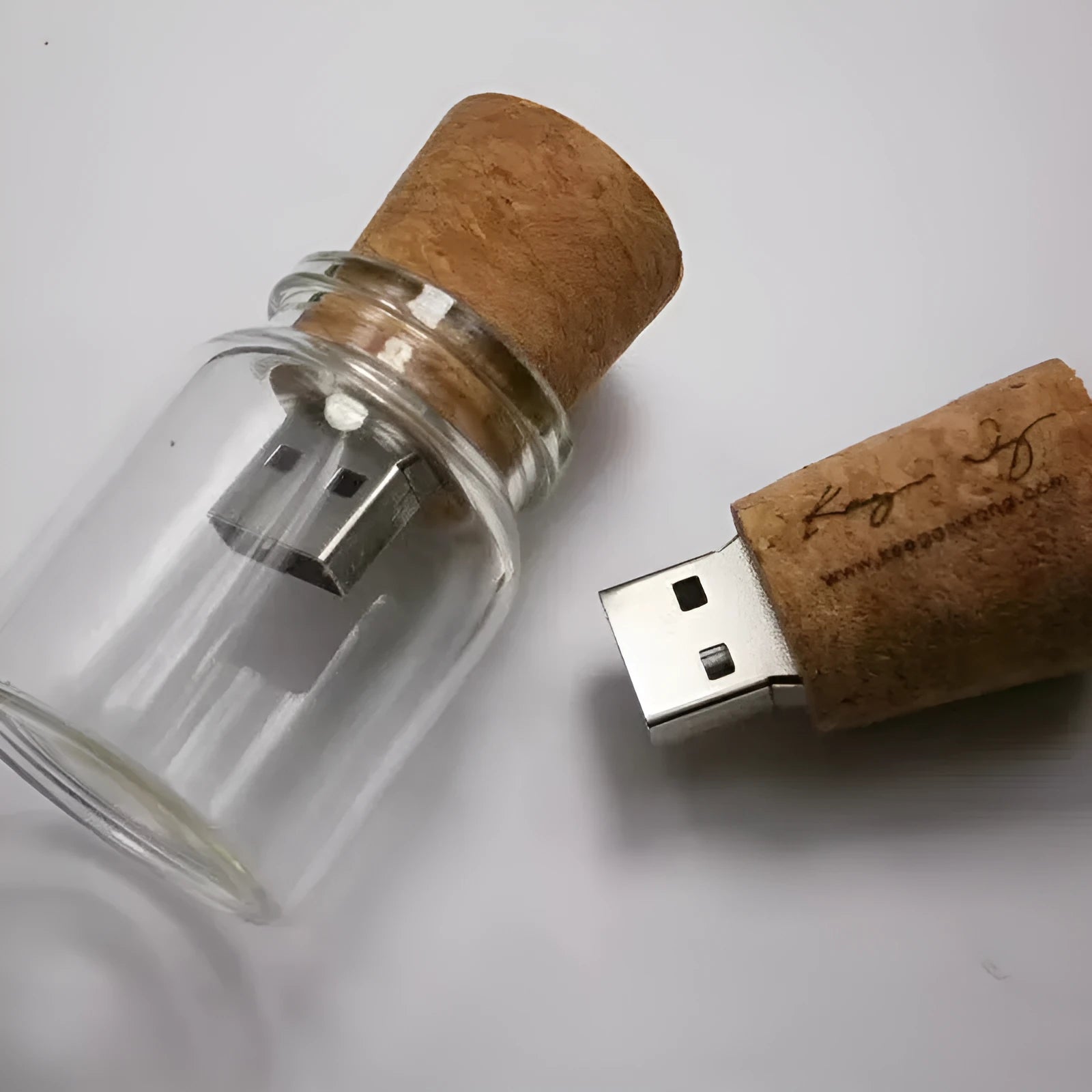 Transparent acrylic drift bottle USB flash drive with wooden cork stopper showing interior USB component