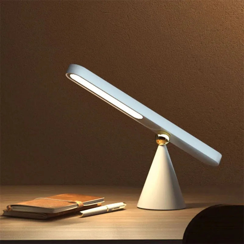 Geometric magnetic suction desk lamp with USB connection and touch controls in white colour