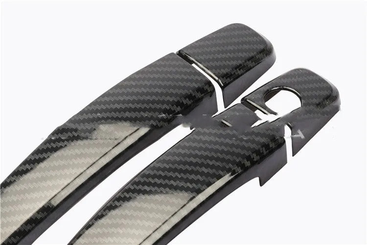 Carbon fibre pattern door handle trim for Opel Vauxhall Astra vehicles