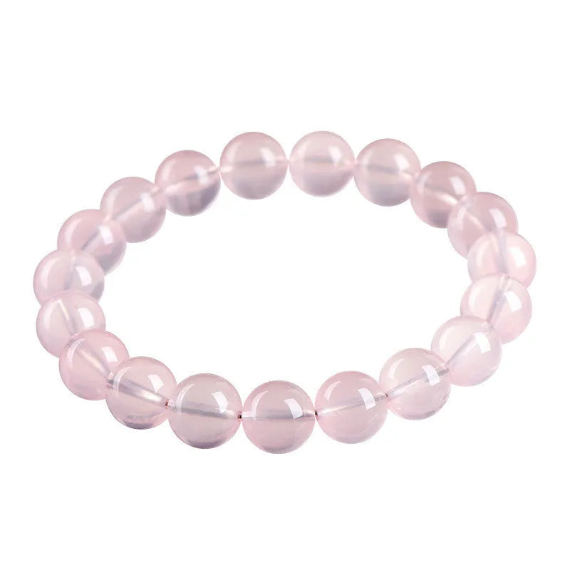 Natural starlight crystal round bead bracelet in pink with polished finish
