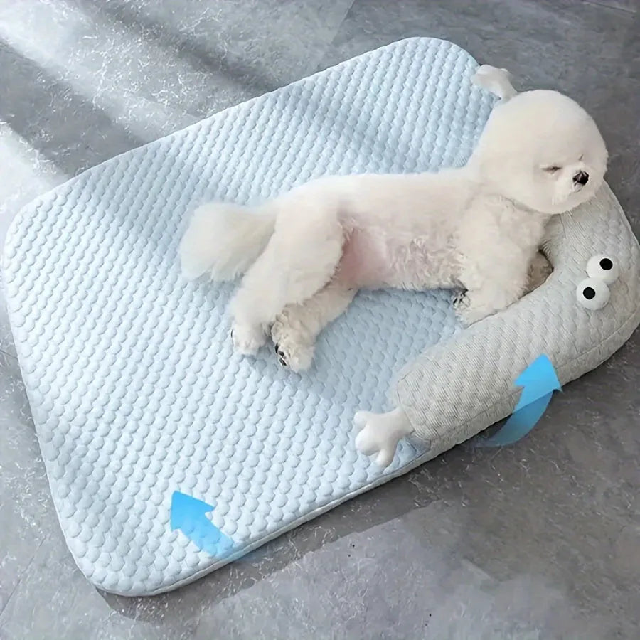 Blue monster design polyester pet bed for dogs and cats on a wooden floor.