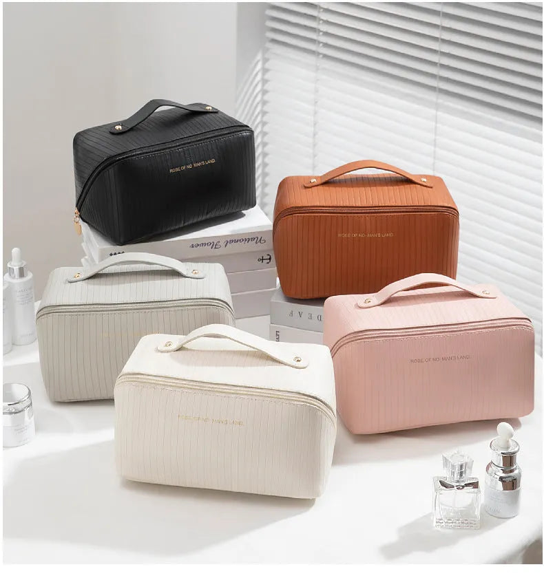 Vertical cubic pillow makeup bag in PU material with 22.5 cm height for travel storage