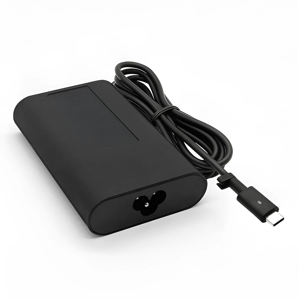 Black 65W USB-C laptop power adapter with multiple international power cords