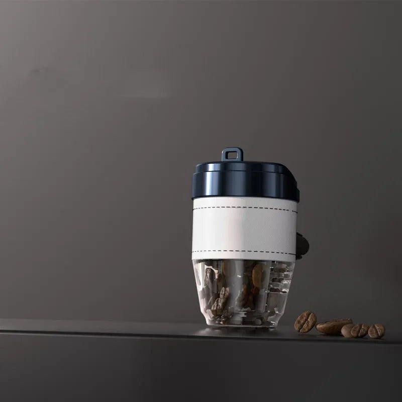 Coffee cup shaped plastic car air freshener in choice of five colours for vehicle odour removal.