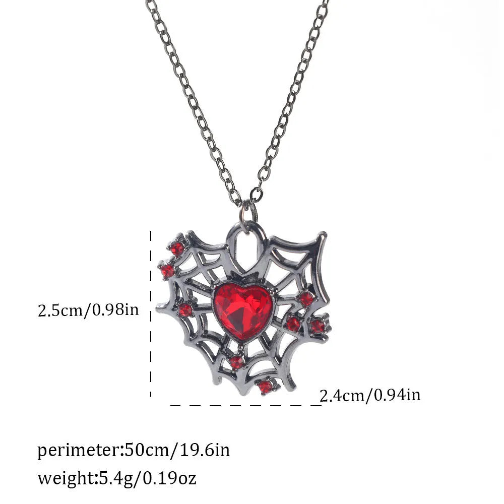 Close-up of a dark electroplated zinc alloy Halloween necklace pendant featuring a spider and bat design on a regular chain.