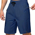 Men's solid colour polyester beach shorts in straight cut design showing colour options