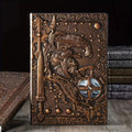 Handmade leather A5 notebook with 3D warriors relief embossed cover, open to show paper pages