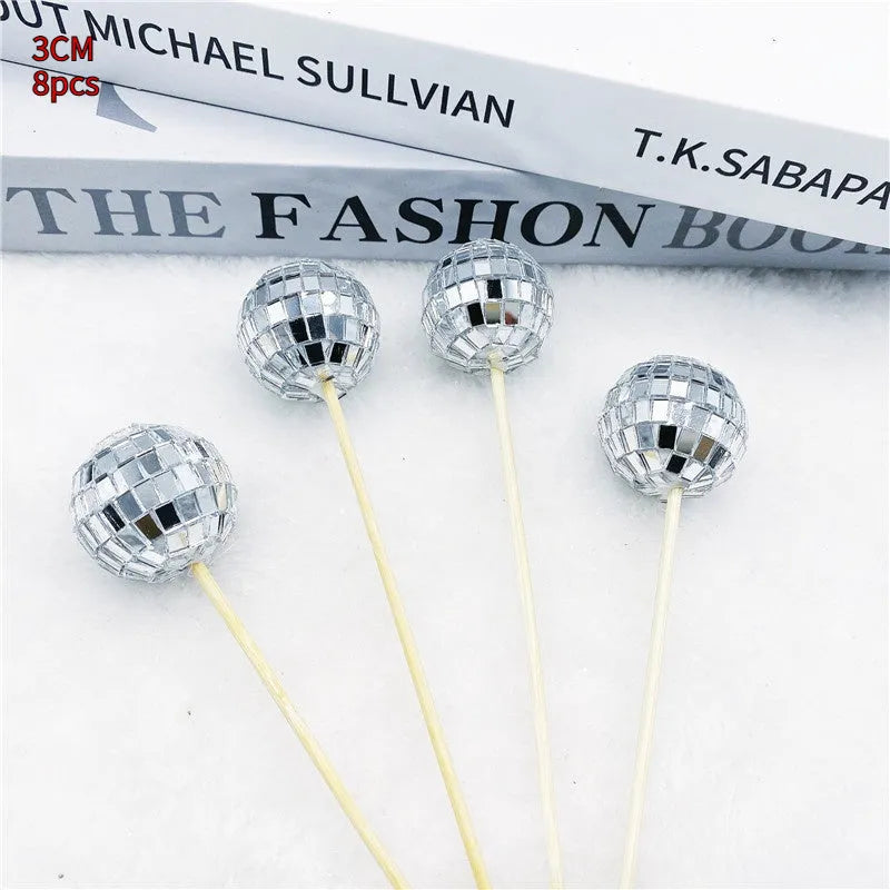 Glass disco ball cake decoration on wooden stick in various sizes from 2.5cm to 5cm diameter