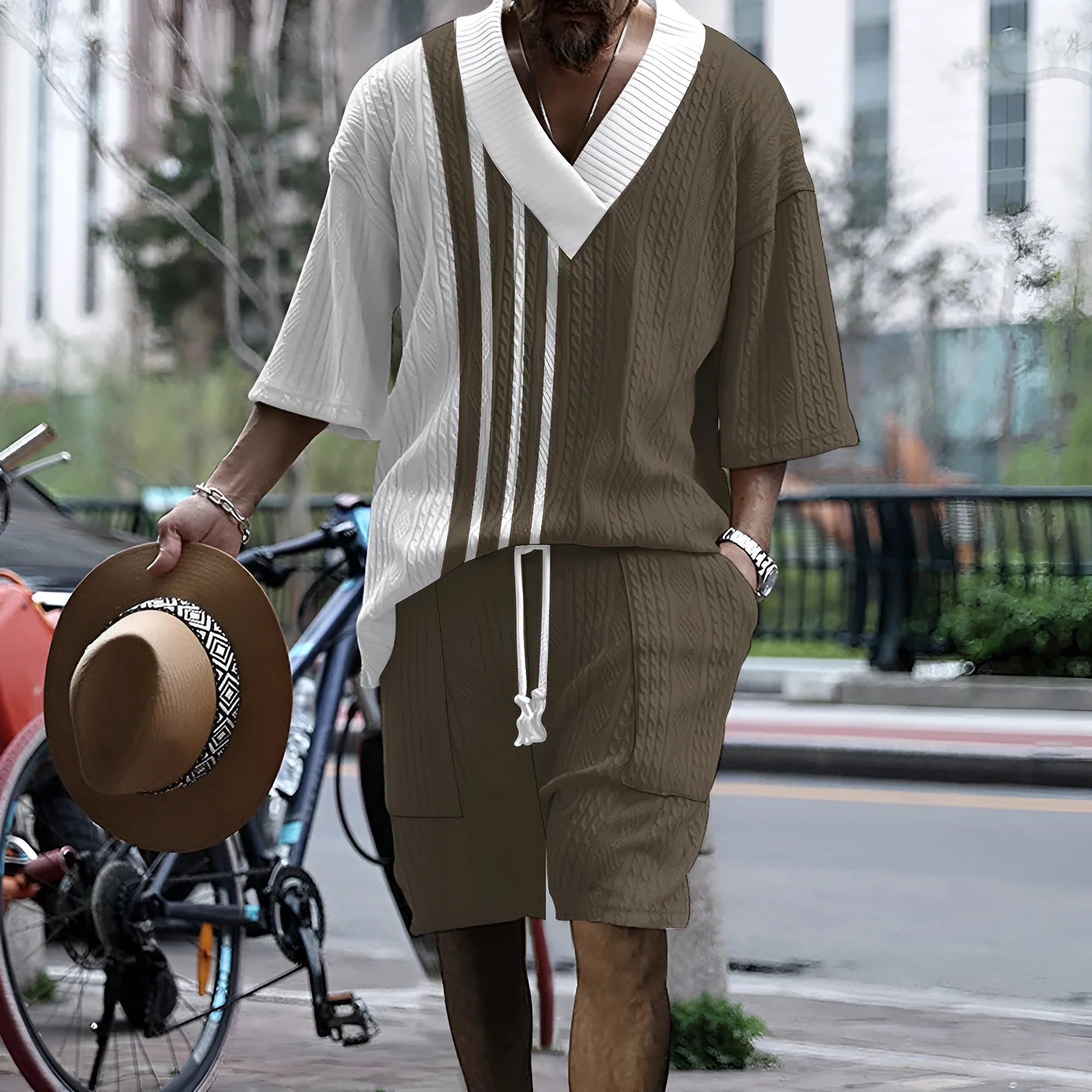 Men's printed drop-shoulder knitted short-sleeved top with matching shorts in a casual suit set.