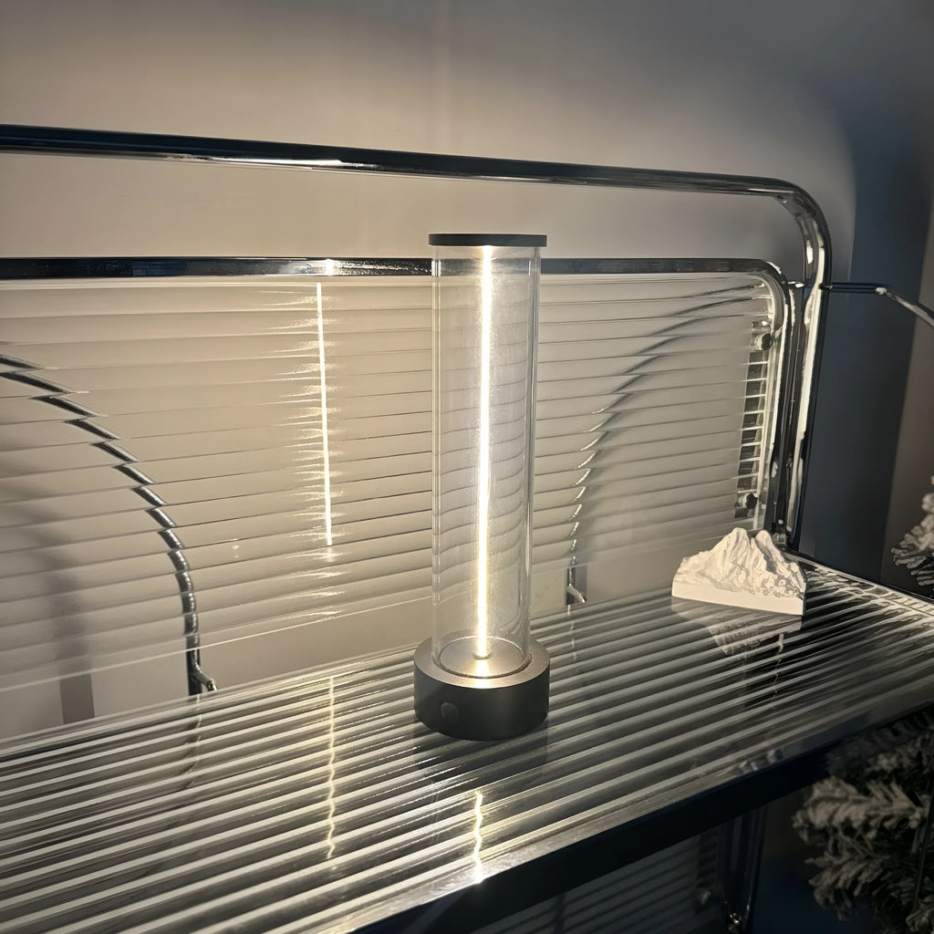 Slim modern glass LED light strip with magnetic base for USB-charged night lighting