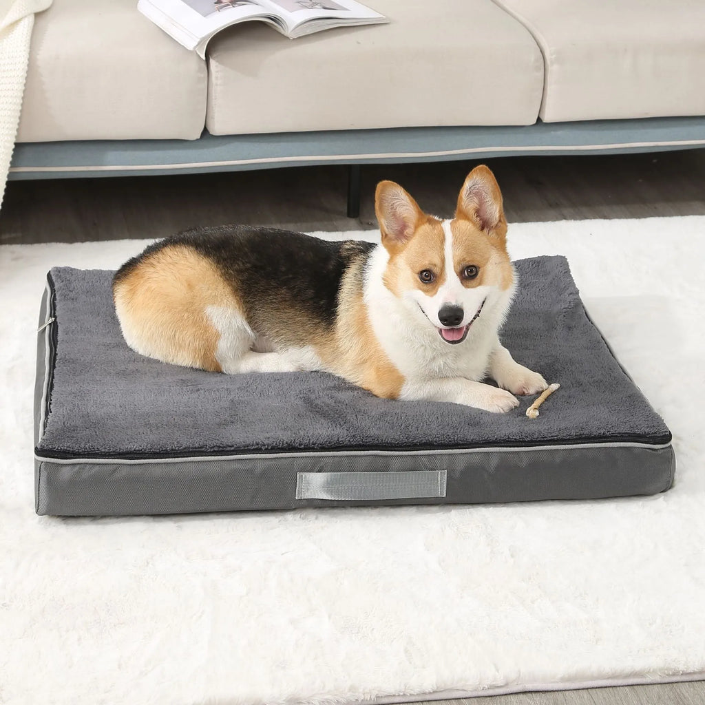 Brown removable washable memory sponge dog mattress pad on a wooden floor.