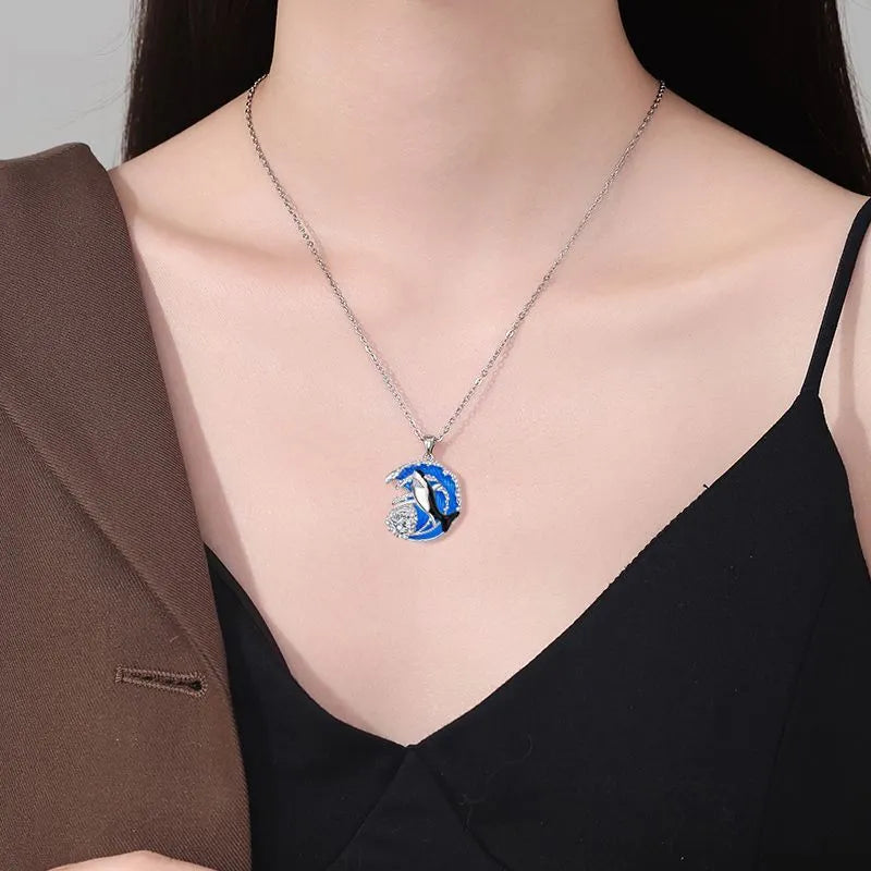 HAILANG women's silver-tone shark pendant necklace on a cross chain, adjustable length.