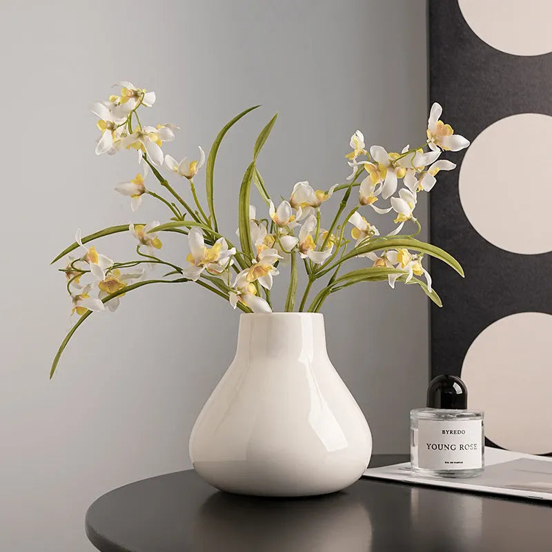 Ceramic round belly French decorative vase with artificial orchid flowers in black or white colour options