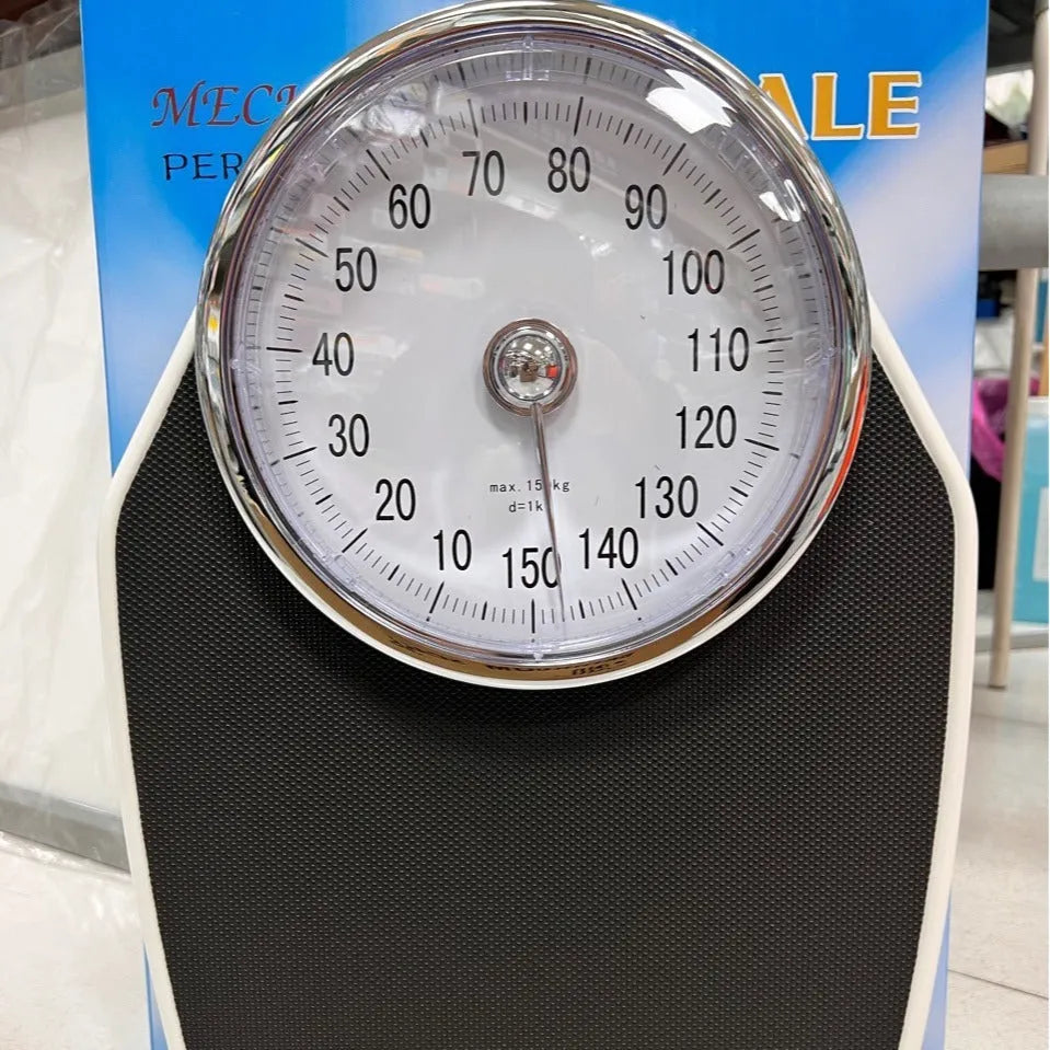 Black mechanical pointer body weight scale showing large dial on 47cm platform
