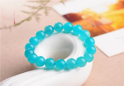 Natural Amazonite crystal bracelet with scattered polished beads in ice colour variations