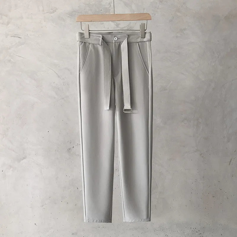 Boys slim straight wool trousers in grey, showing tapered fit and straight leg opening.
