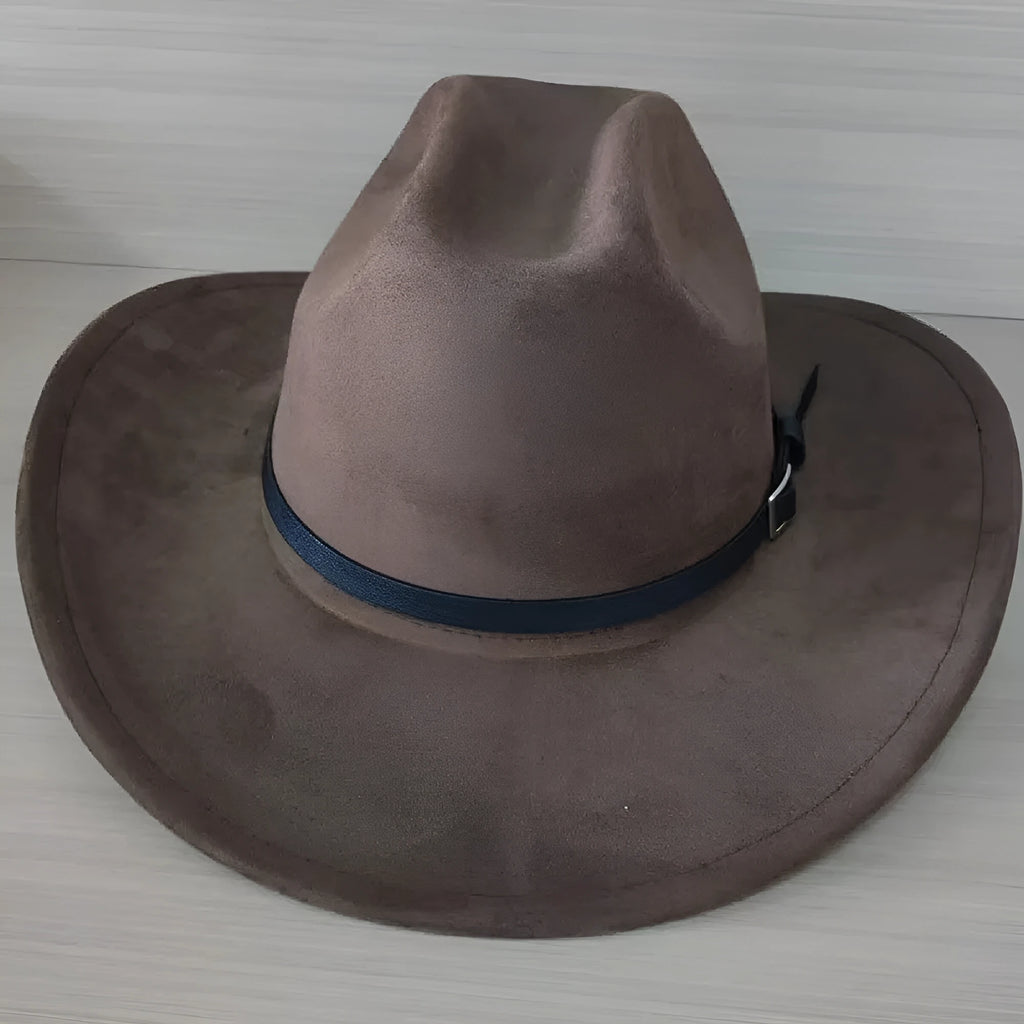 Brown leather velvet curved-edge western cowboy hat with a conical crown on a plain background.