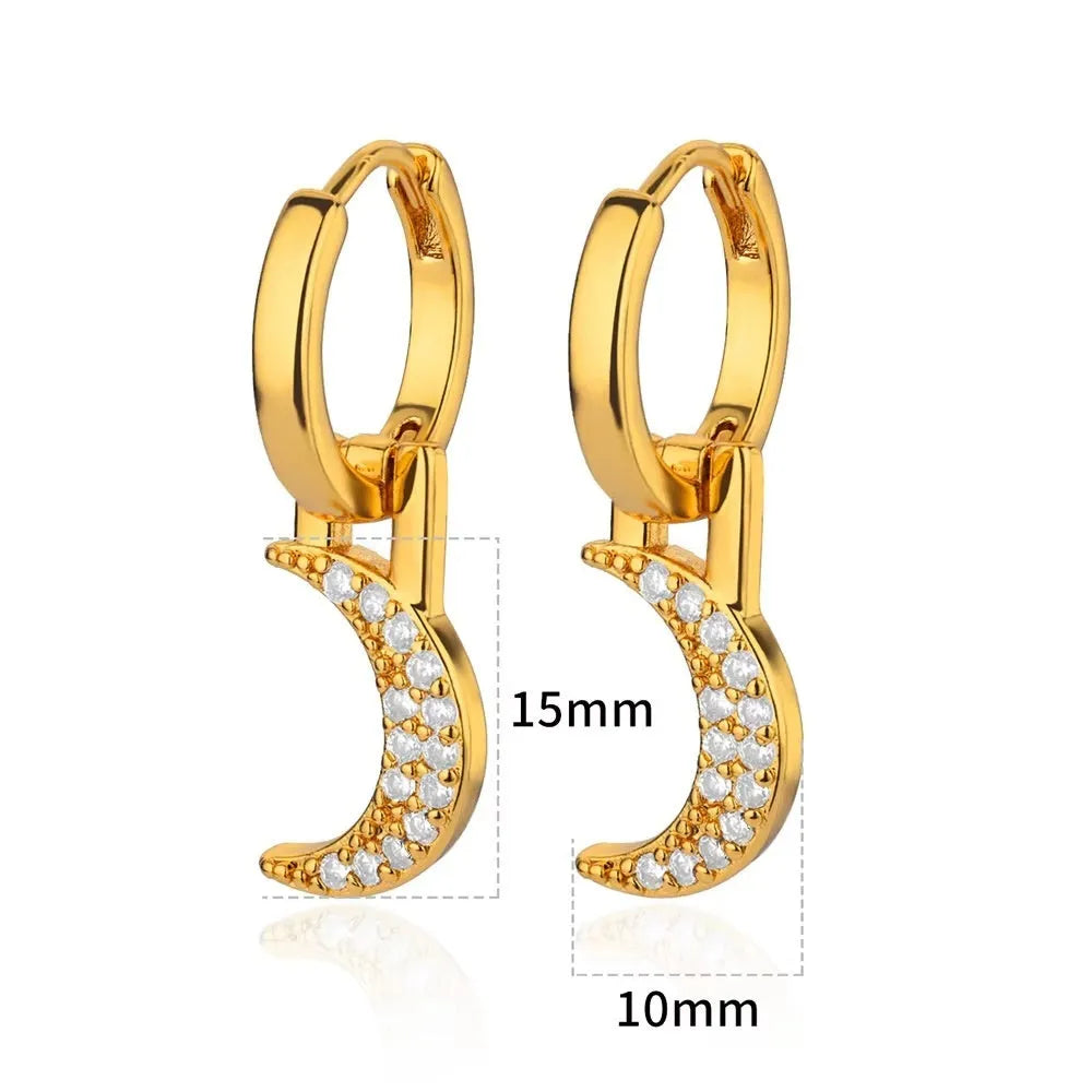Women's geometric butterfly-shaped copper earrings with heart and star details in assorted colours.