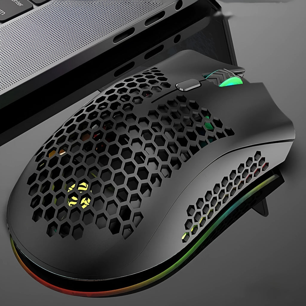 Hollow out patterned wireless gaming mouse with illumination, shown in cyan colour