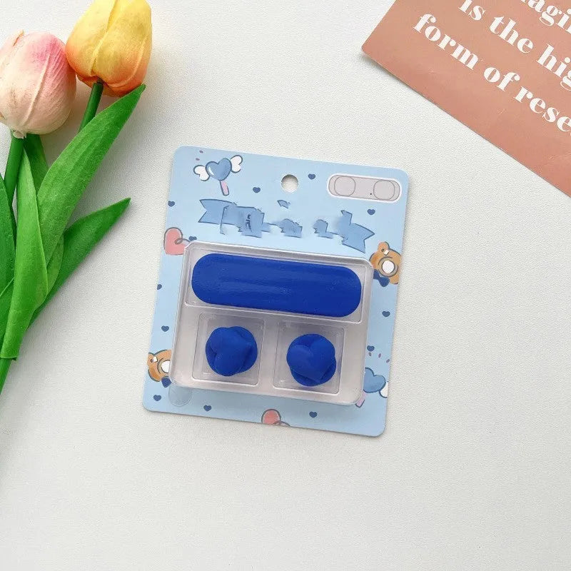 Cartoon style plastic cable fixer for organising desktop magnetic hub cables