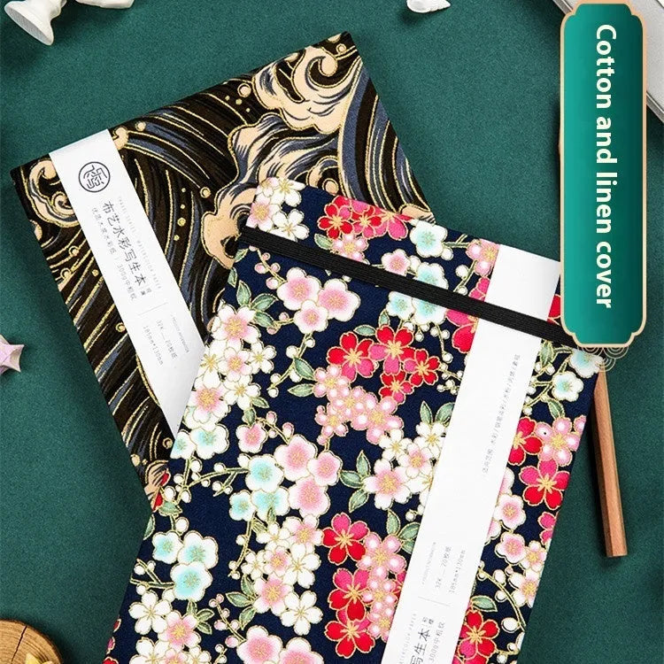 Feiluniao handmade fabric watercolour sketchbook with decorative cover, shown at 185mm length.