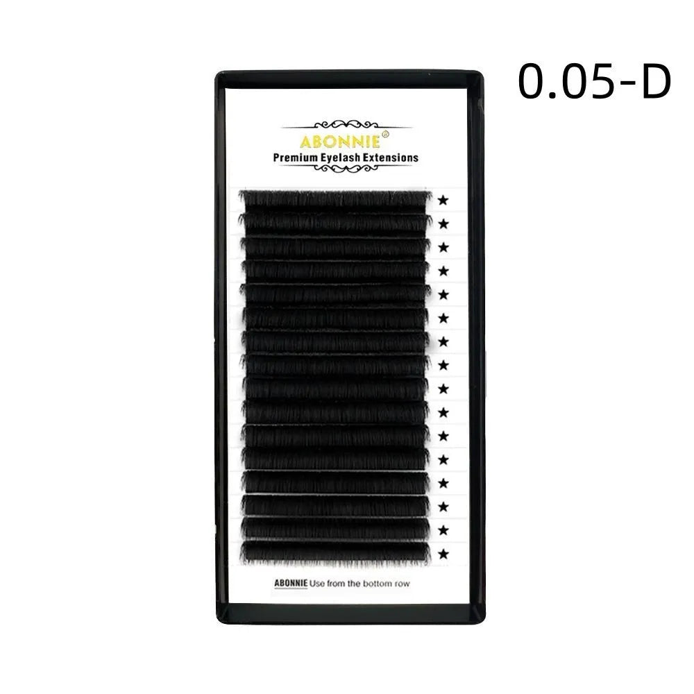 Pack of false eyelashes showing dense 16-row mink hair lashes on a clear band.