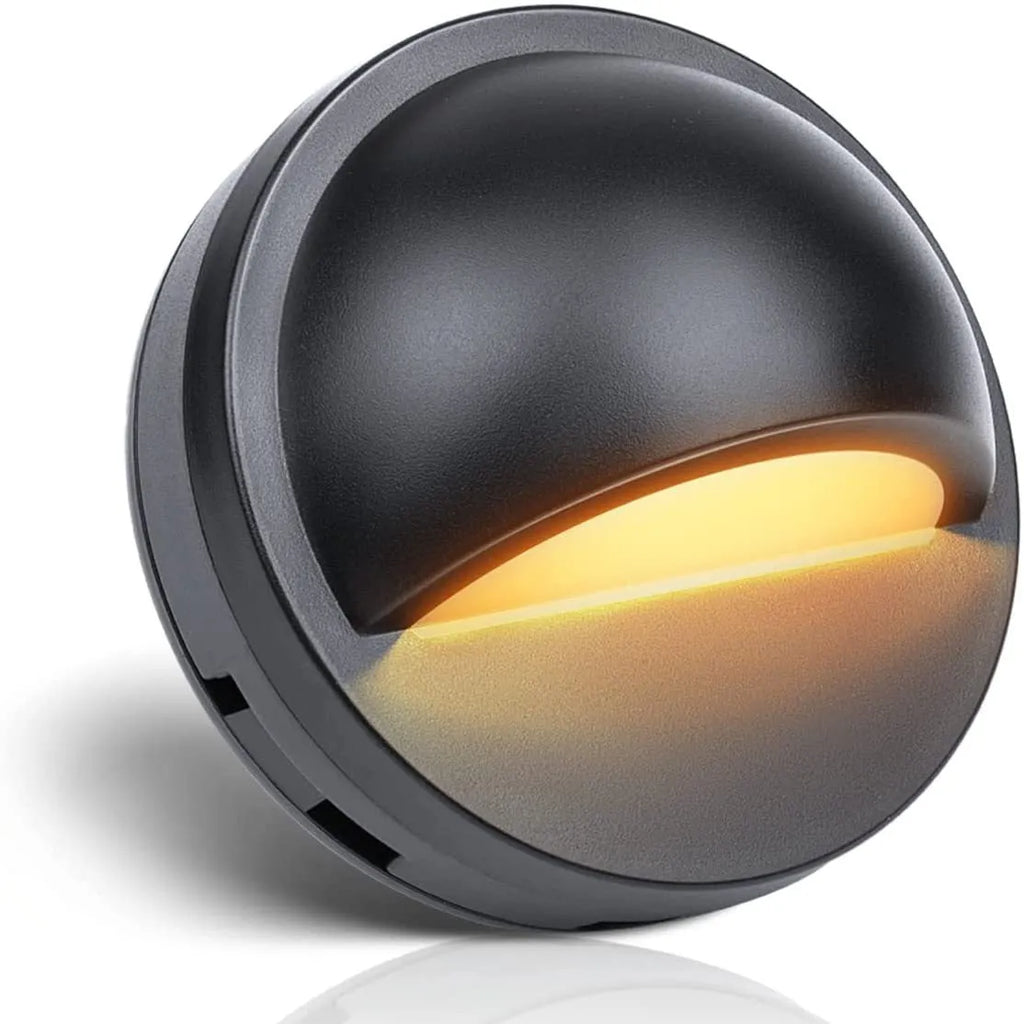 Platinum coloured outdoor step light with low voltage cable for garden path illumination