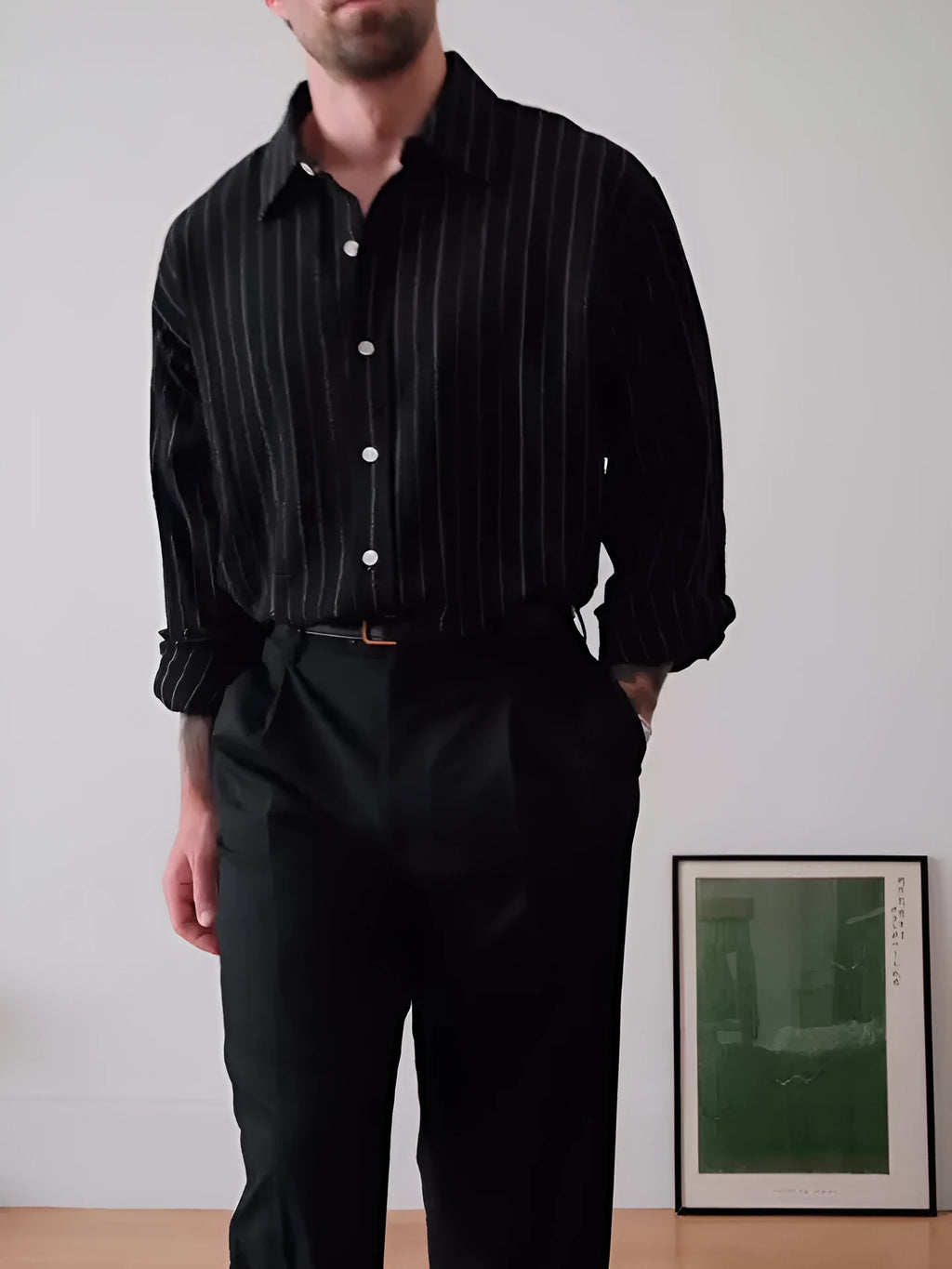 Black and white pinstriped men's long sleeve button-down shirt with a regular fit.