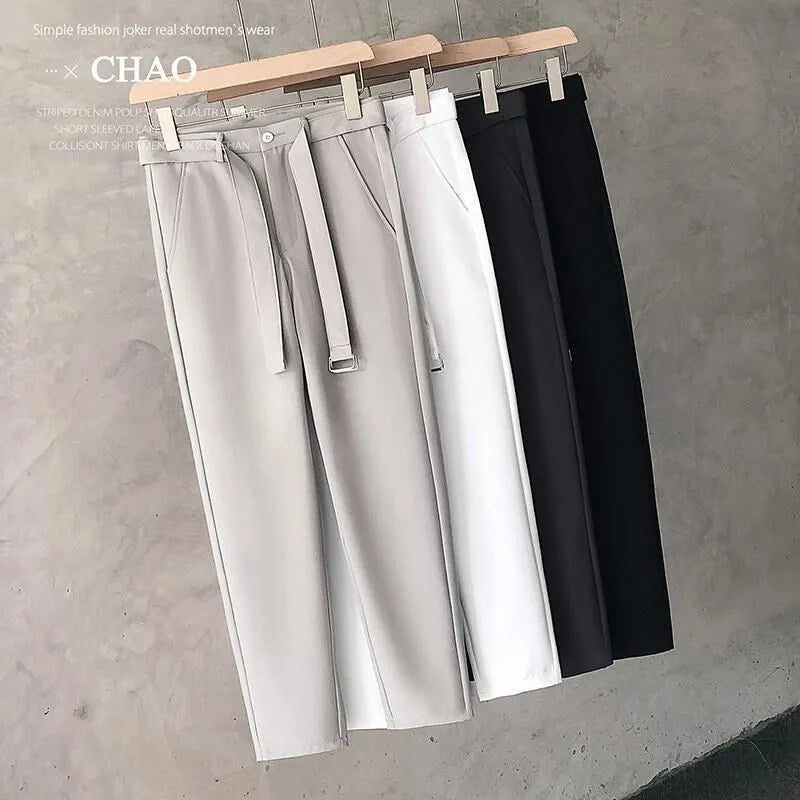 Boys slim straight wool trousers in grey, showing tapered fit and straight leg opening.
