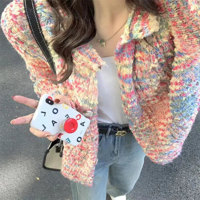 Pink or green acrylic knitted rainbow cardigan with regular sleeves and medium thickness