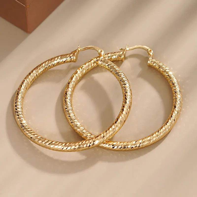 Women's geometric clip earrings with ring and line design in multiple colour options