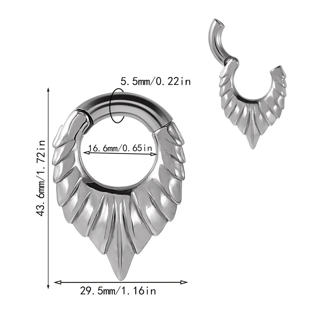 Stainless steel drop-shaped ear extender with totem design on a grey background.