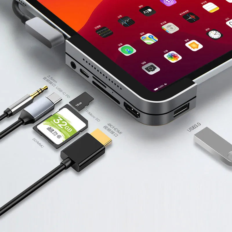 Silver aluminium grey 6-in-1 USB-C docking station for iPad Pro with HDMI and USB ports.