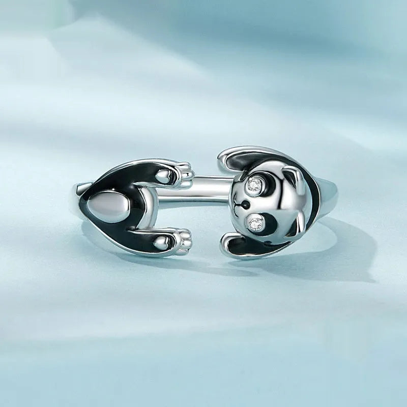 Adjustable sterling silver panda ring with white gold plating and open bracelet design.