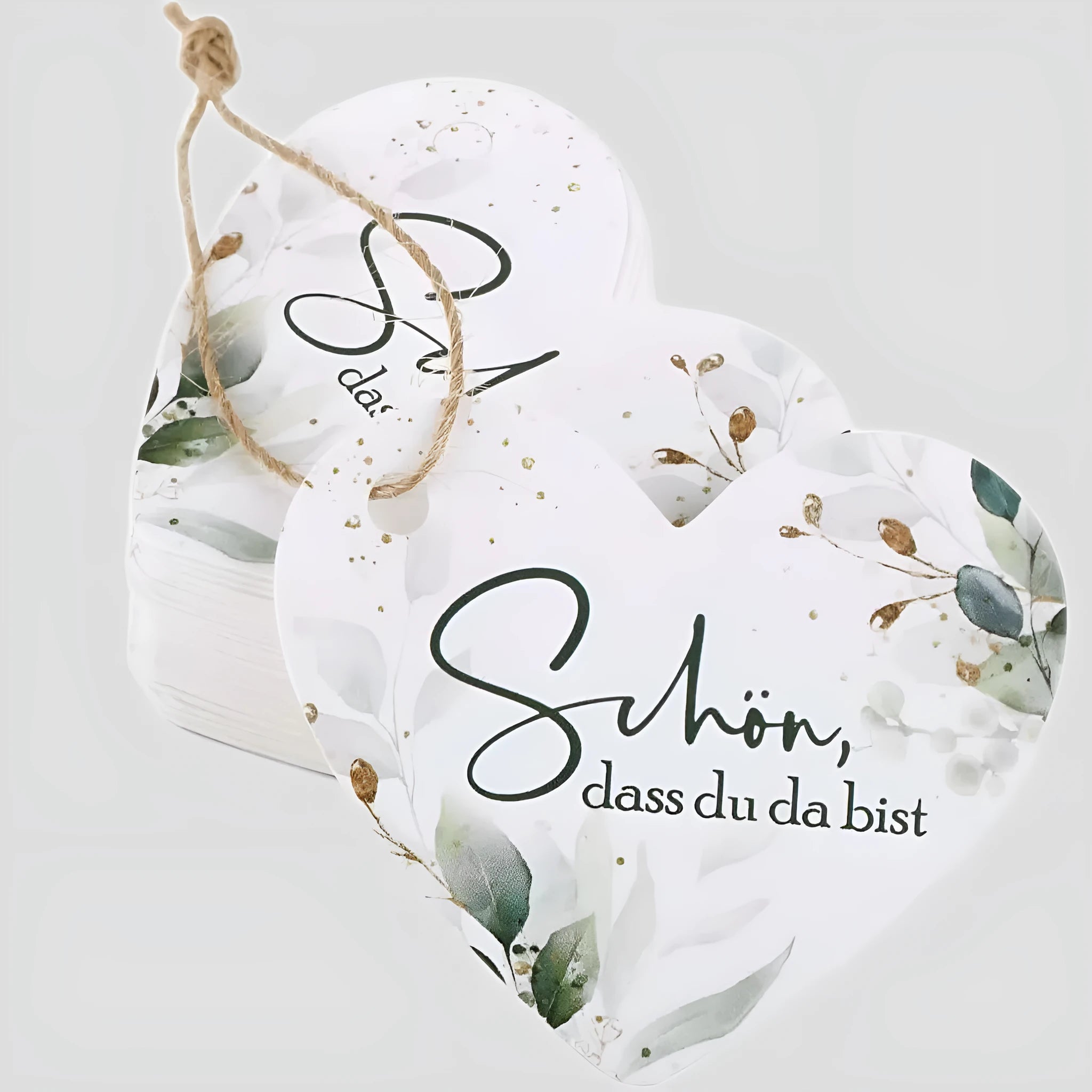 Pack of 50 floral design heart-shaped paper gift tags in two colour style options.