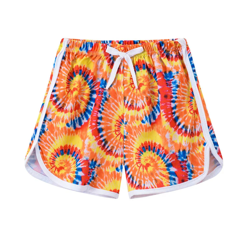 Children's polyester beach shorts in multiple prints and solid colours with size range 100-140cm