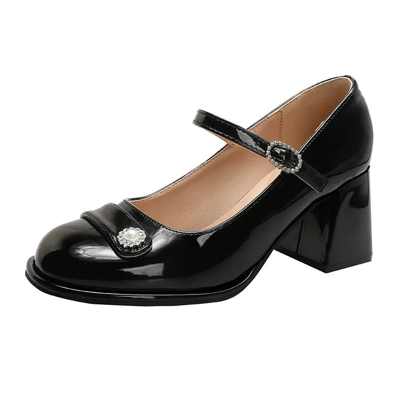 Women's black patent leather chunky heel high heels with round toe and buckle fastening