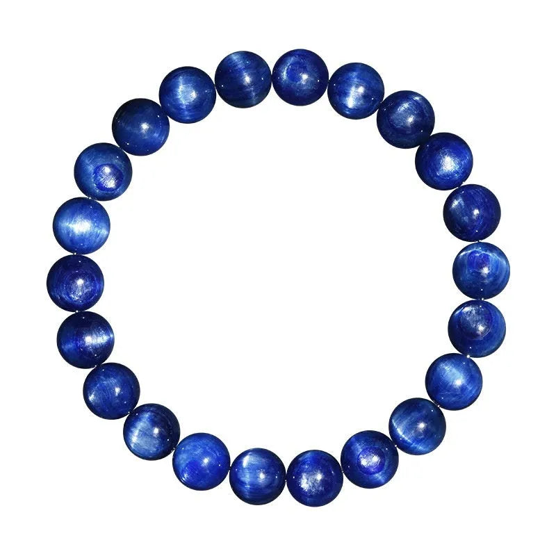 Polished blue crystal ball bracelet with Ruyi charm on a white background.