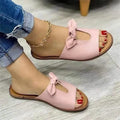 Ladies fish mouth style sandals with a decorative bow on the upper, in black colour.
