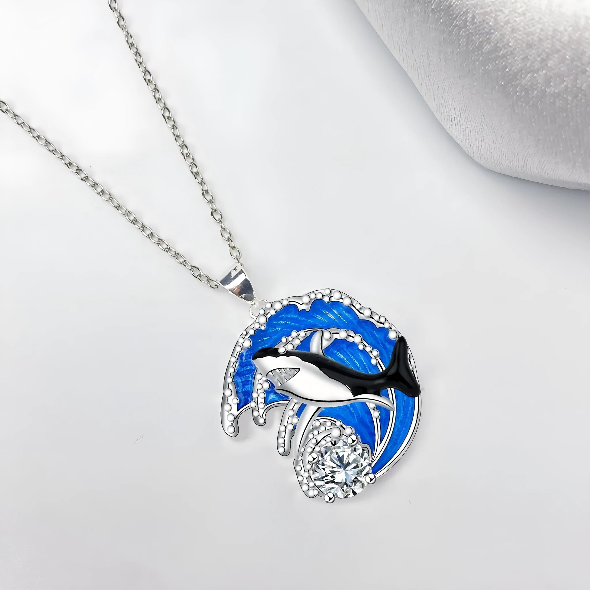 HAILANG women's silver-tone shark pendant necklace on a cross chain, adjustable length.