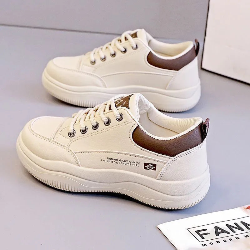 Women's Korean-style white leather shoes with cross straps and lace-up front