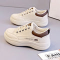Women's Korean-style white leather shoes with cross straps and lace-up front