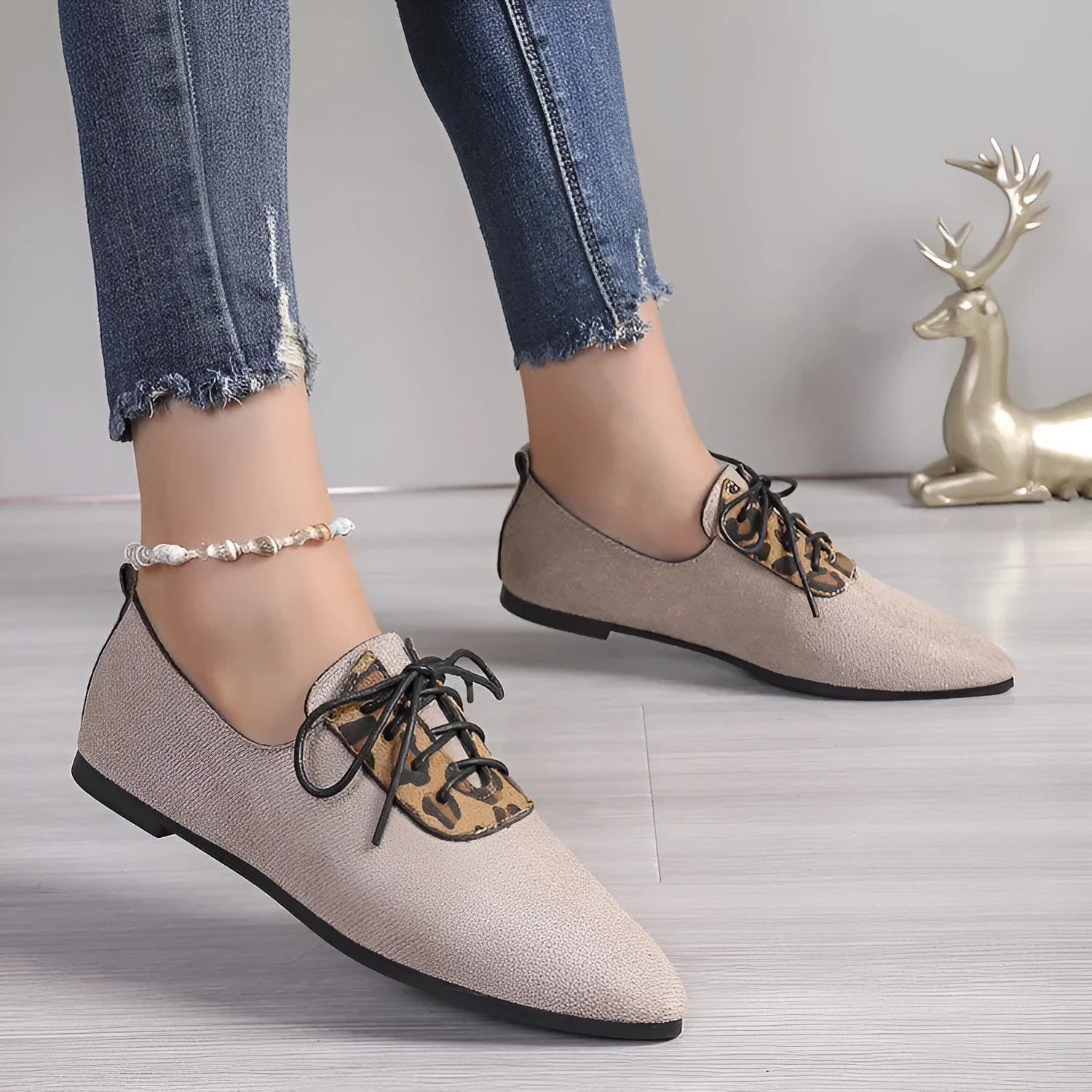 Beige leopard print plus-size women's pumps with pointed toe design on rubber sole
