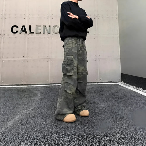 American vintage crumpled camouflage cargo pants with multiple pockets on a cotton blend fabric.