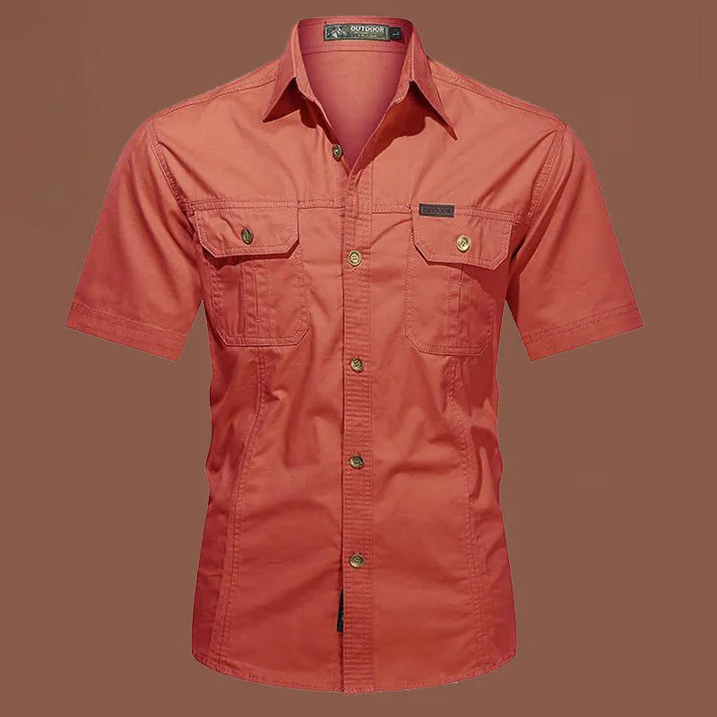 Men's short sleeve cotton work shirt in loose fit cardigan style showing non-ironing construction