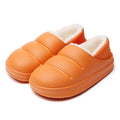 Women's waterproof EVA garden slippers in assorted colours with plush lining and non-slip soles.