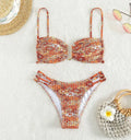 Women's high-waisted floral bikini swimsuit in blue, orange, pink, or rose red.