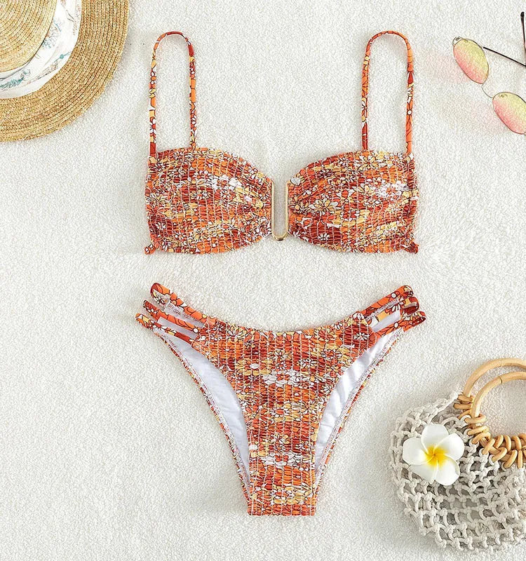 Women's high-waisted floral bikini swimsuit in blue, orange, pink, or rose red.