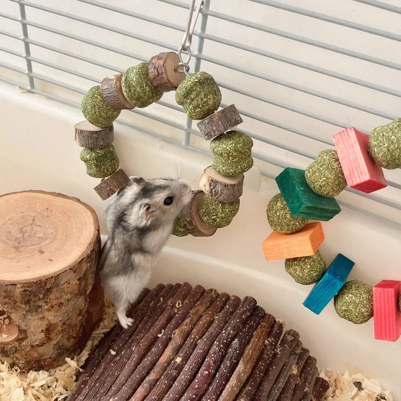 Small pet straw ball ring chew toy in coloured sequin or Applewood options