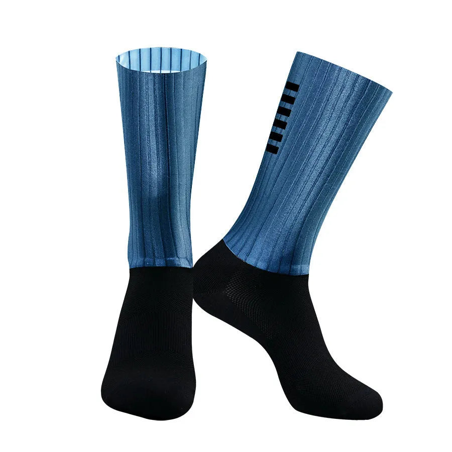 Athletic sports socks for cycling and running in six colour options including orange, black, and purple.
